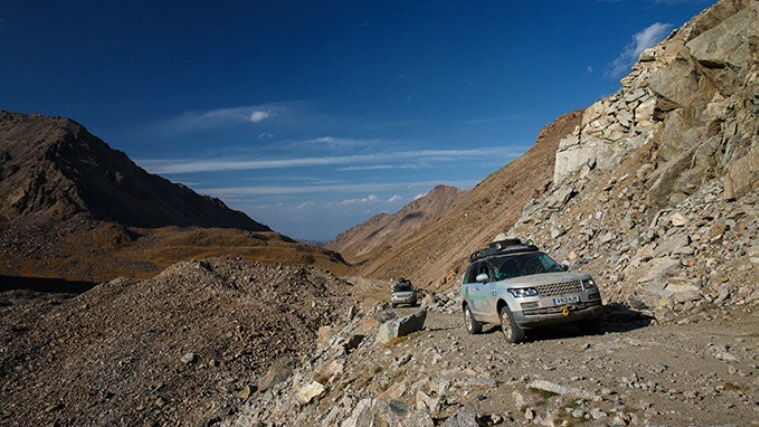 Land Rover Riding on Hilly Road