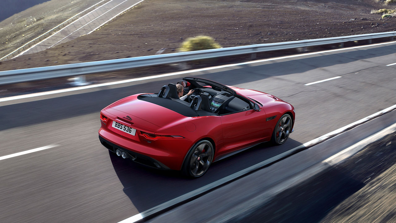 Jaguar F-Type running on highway road 