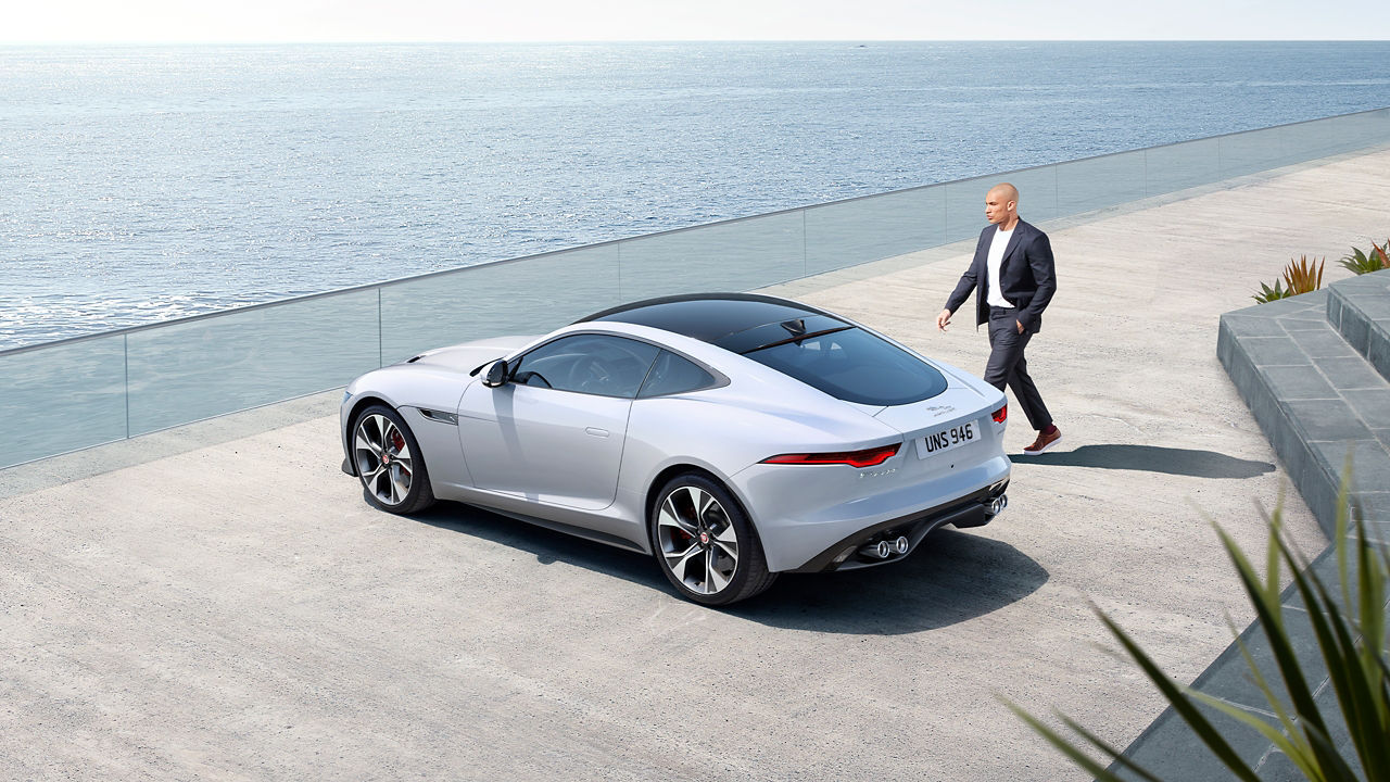 Jaguar F-Type parked near sea side