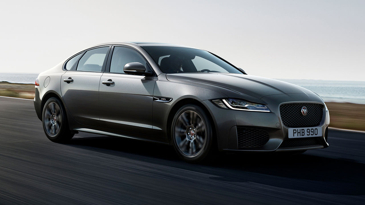 Jaguar XF Running on a Beach Side Road