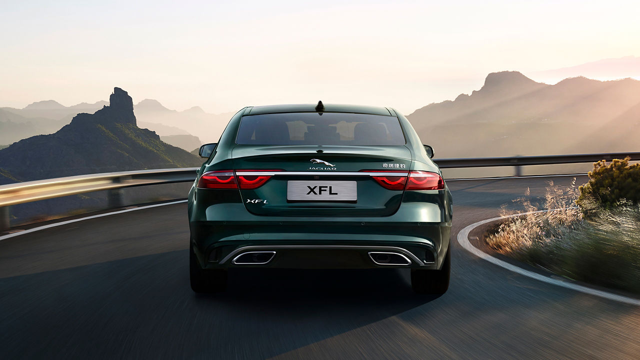 Jaguar XF driving onto the mounted road