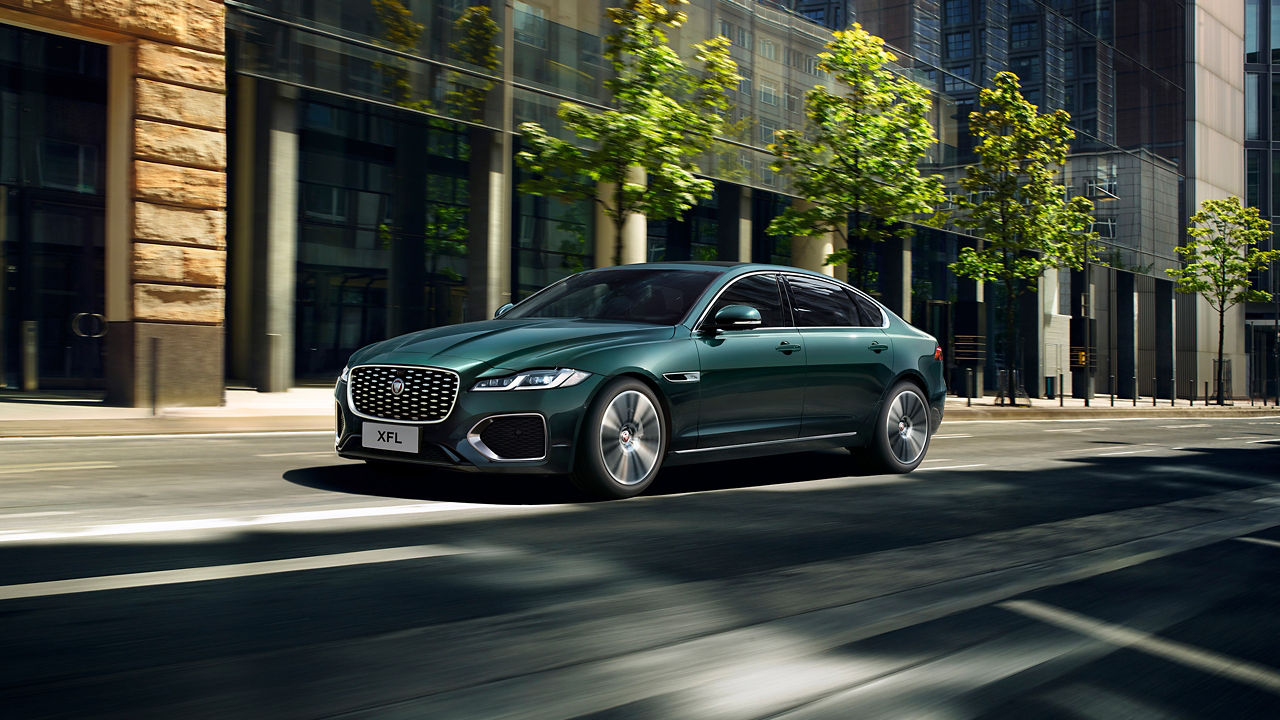 Jaguar XF driving onto the city road