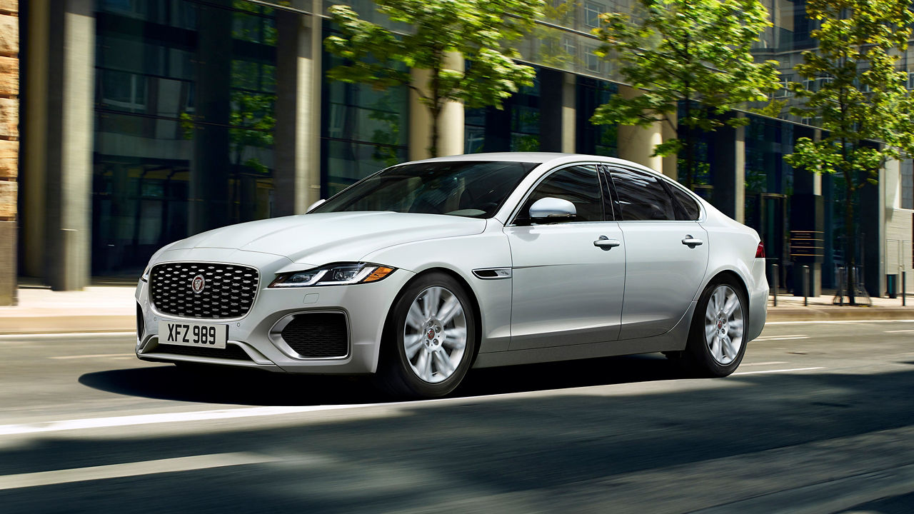 Jaguar XF running on city road