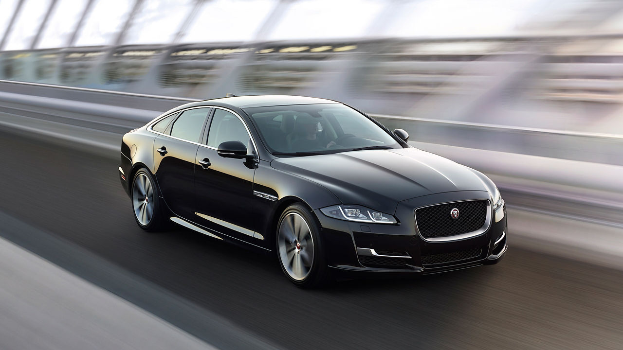 Jaguar XJ running on the road