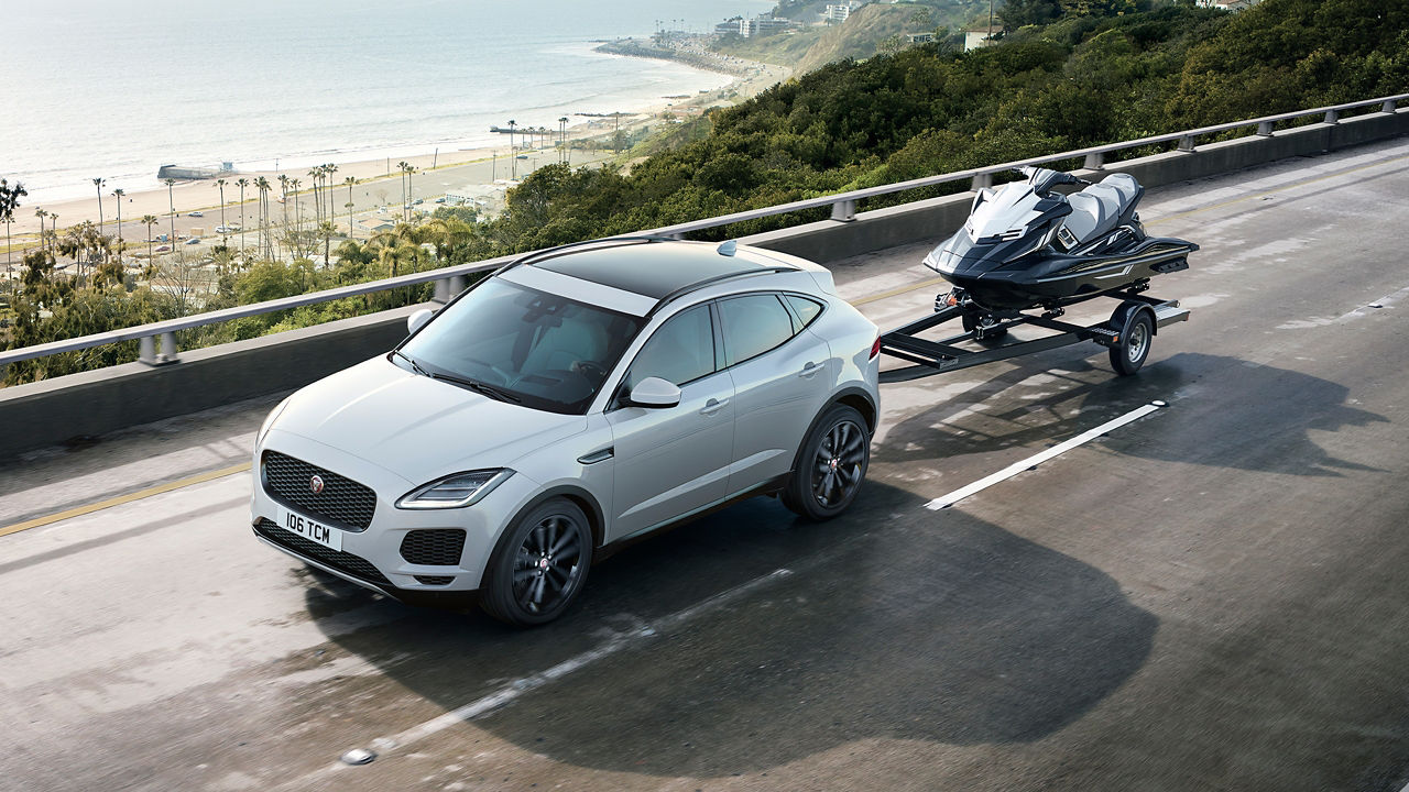 Jaguar E-Pace with Open watercraft trailer