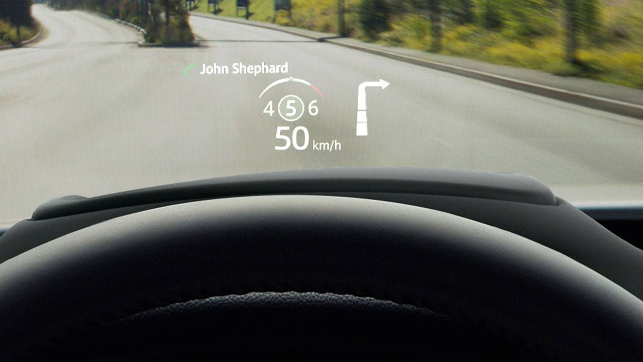 Jaguar E-Pace digital navigation in front of driving screen