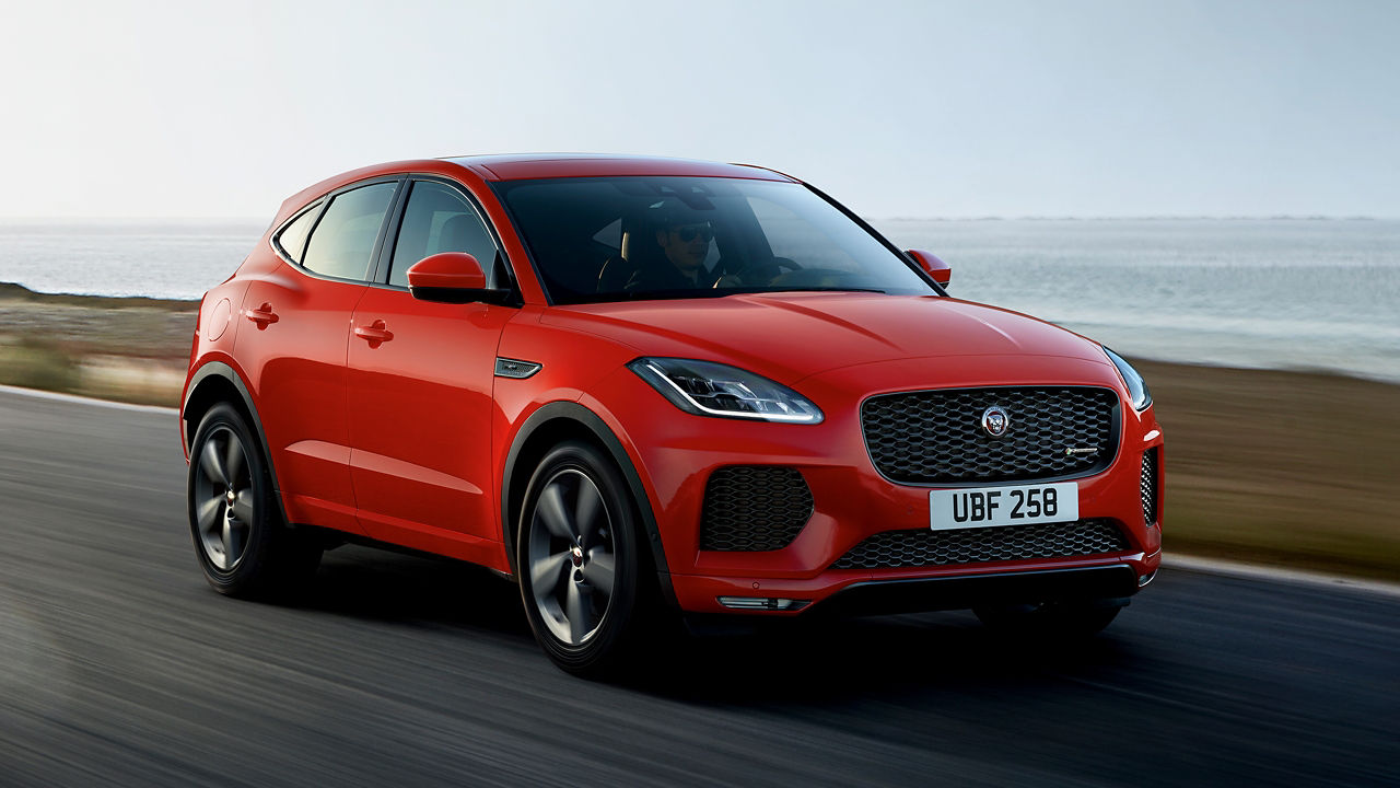 Jaguar E-PACE running on the beach road