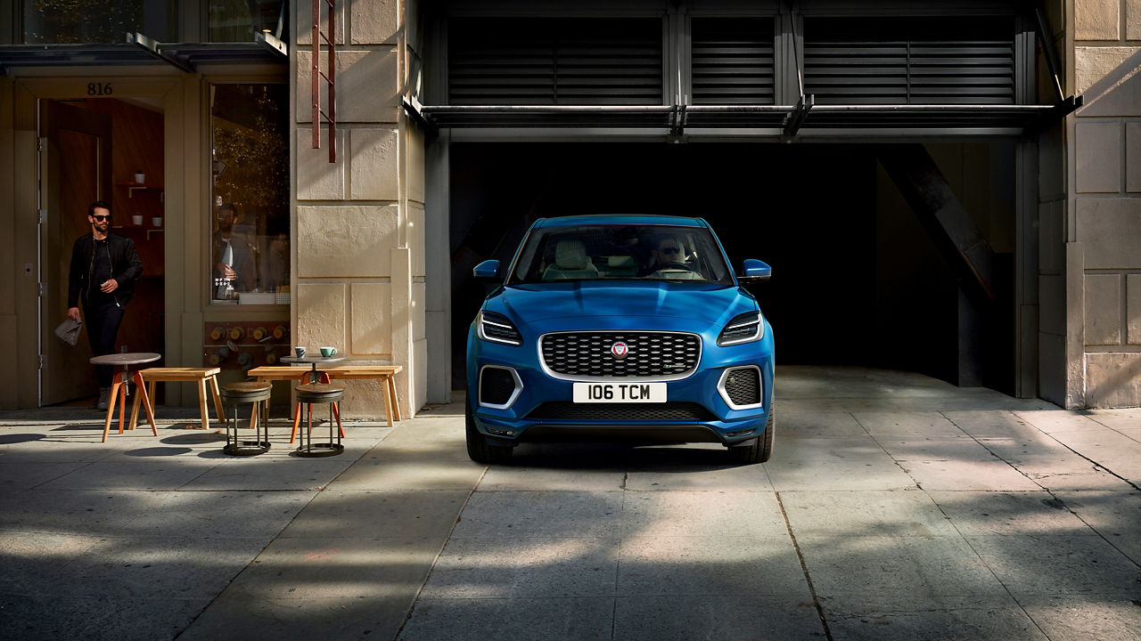 Jaguar E-Pace parked in front of building 