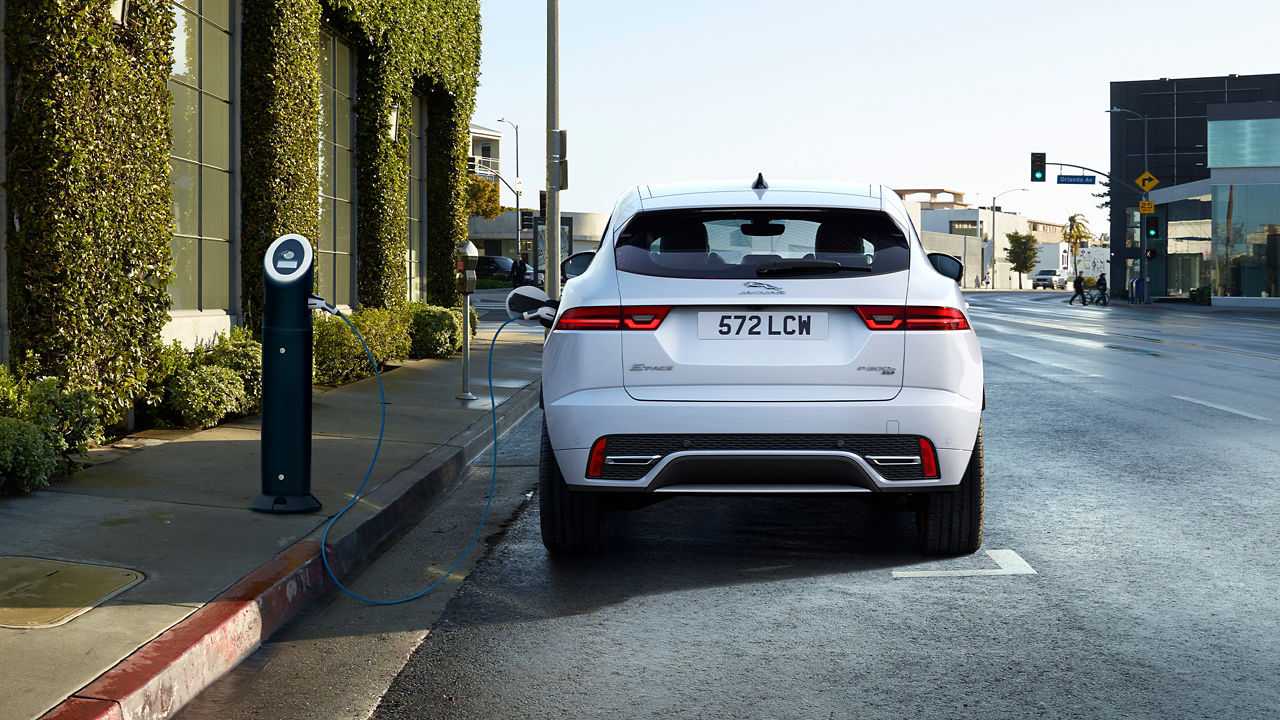 Jaguar E-Pace parked at road side for charging