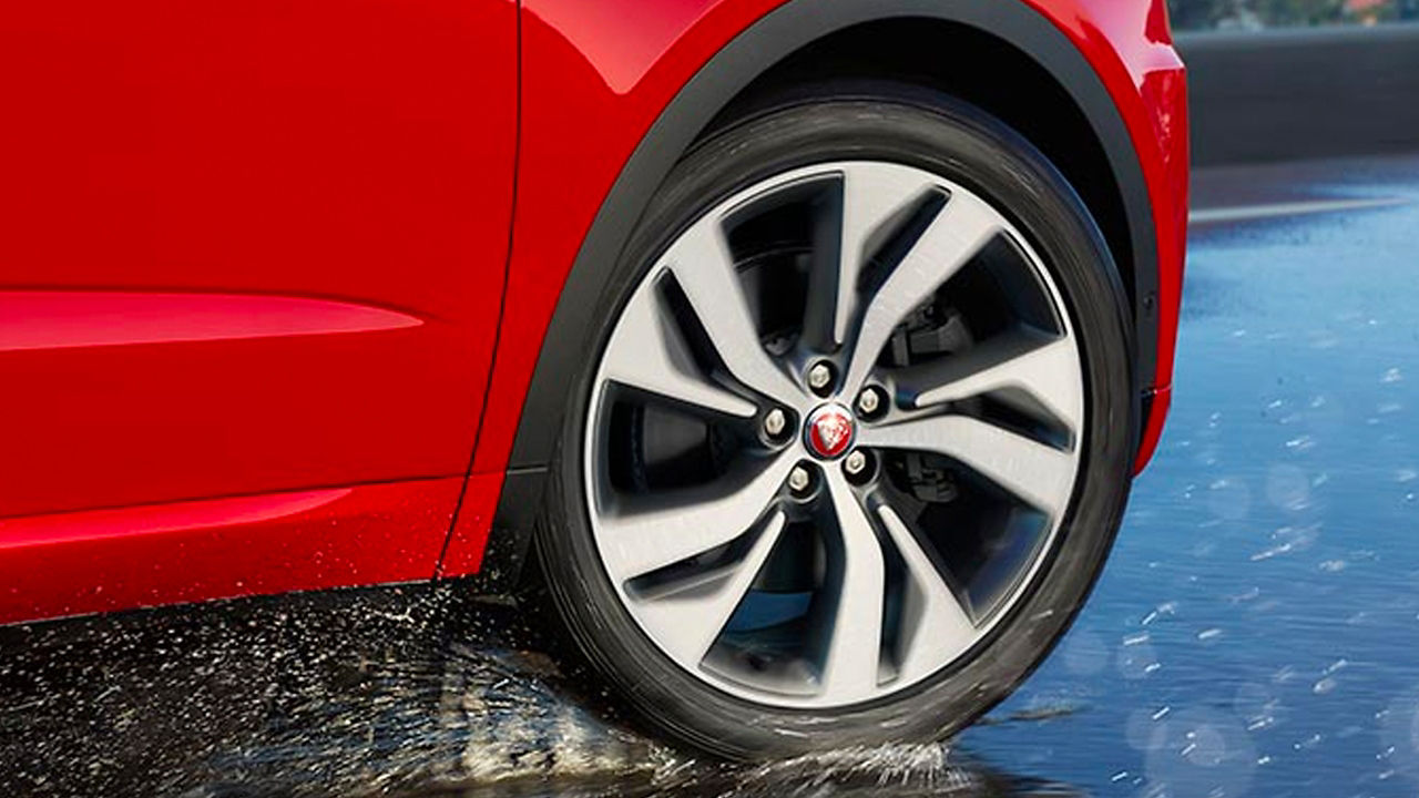 Jaguar E-Pace running on stable wheels, close-up view