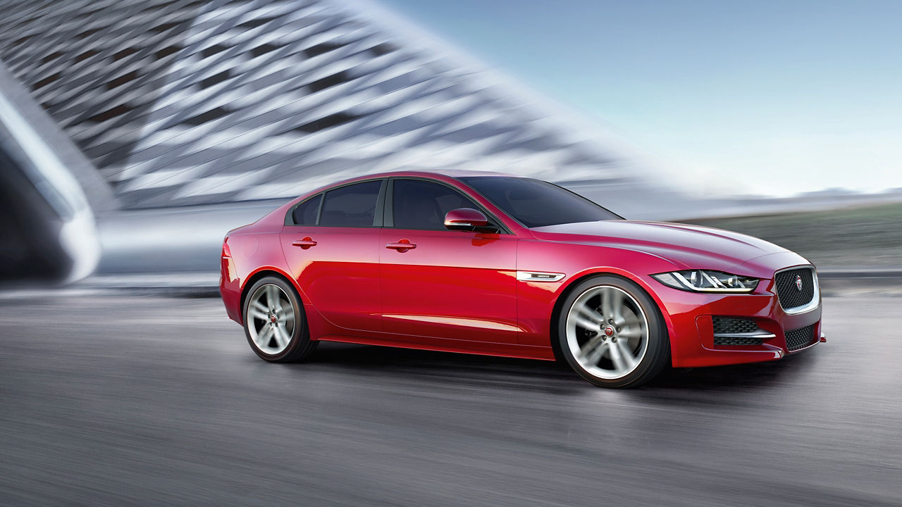 Jaguar XE Running on a Airport Road