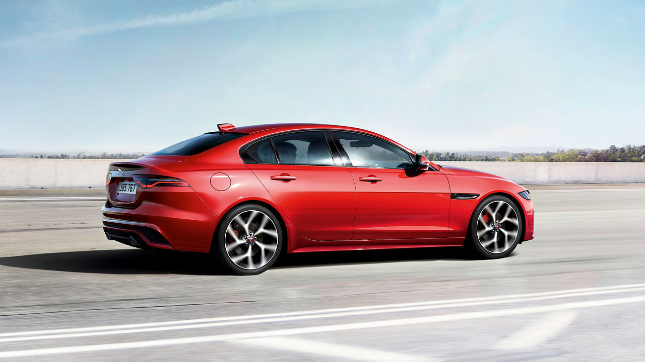 Jaguar XE running car with stable motion shot 