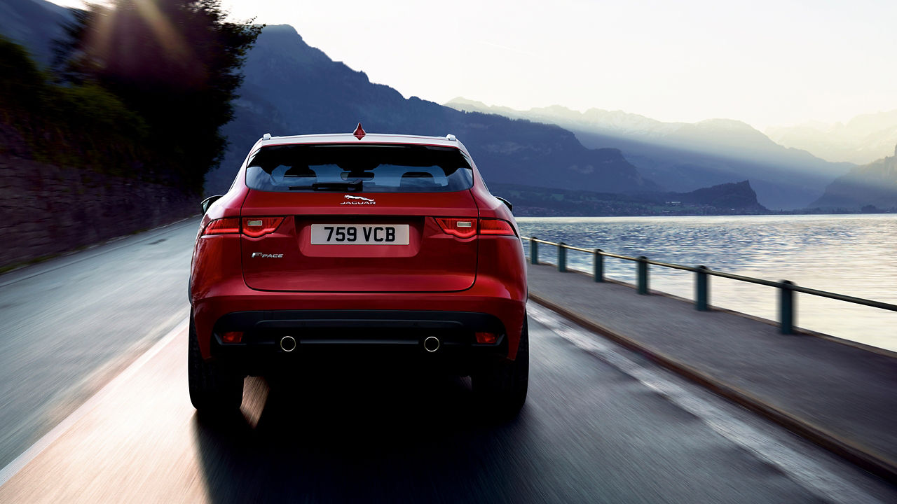 Jaguar F-PACE running on river side road