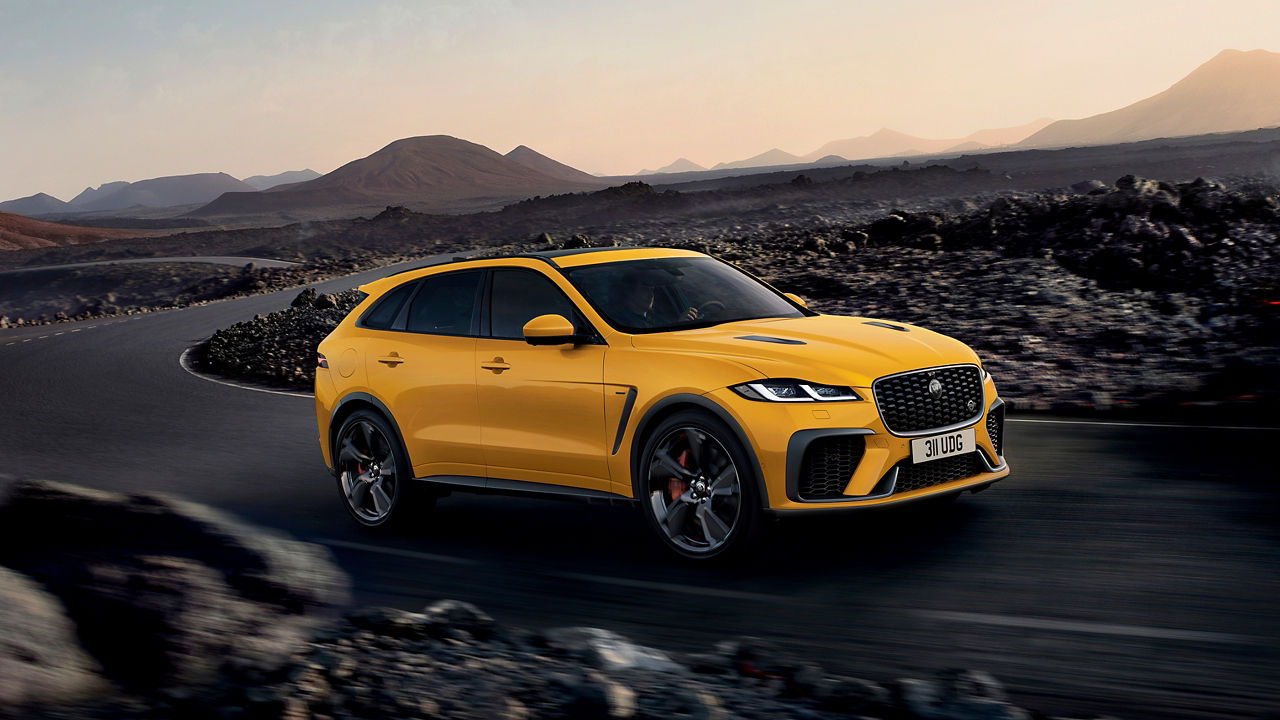 Sorrento Yellow color F-pace on road