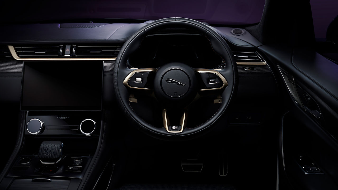 Jaguar F-Pace close-up of the steering wheel and dashboard
