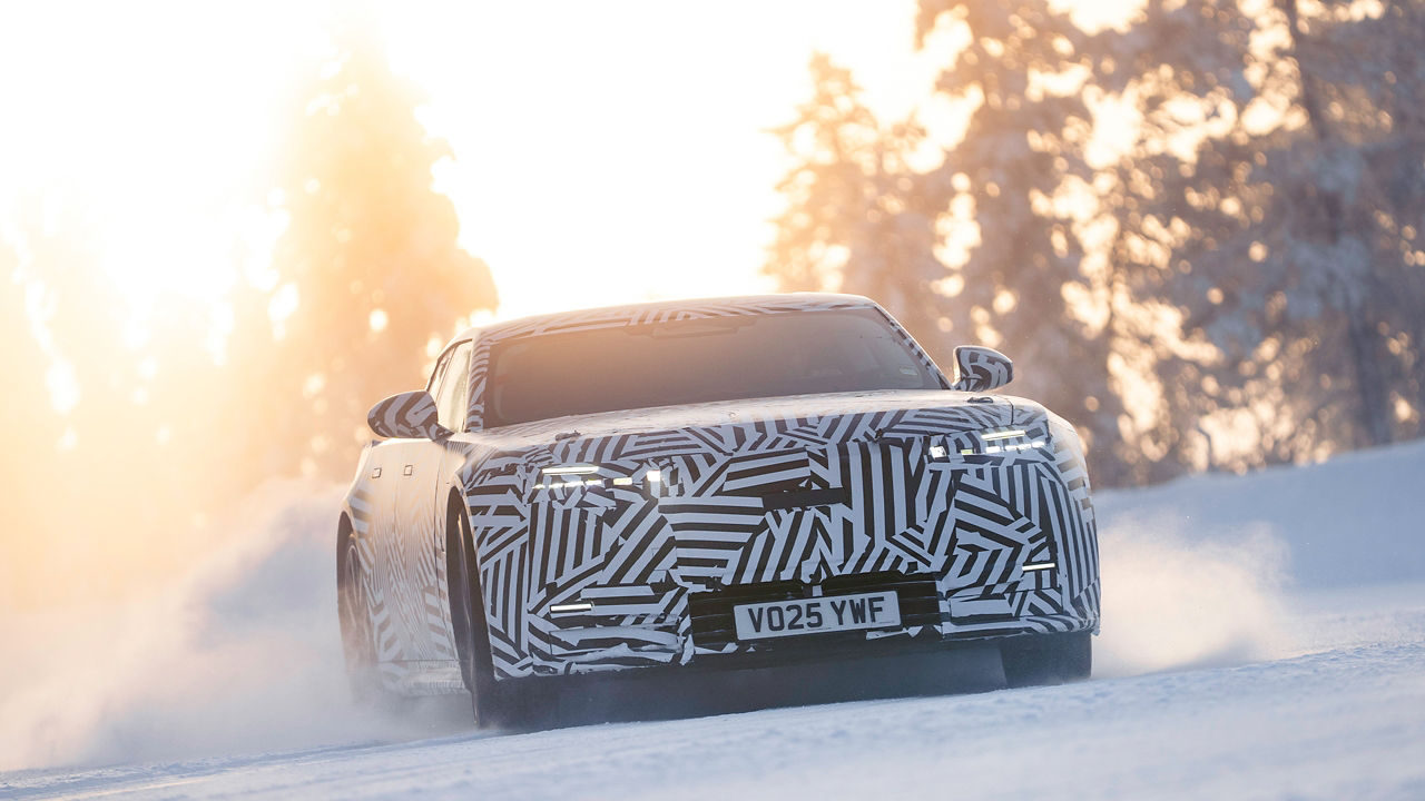 future jaguar drifting in snow path