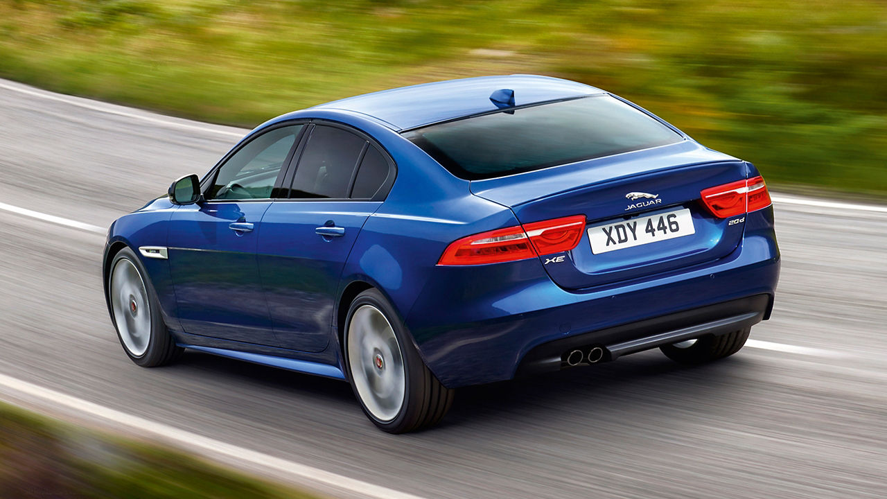 Jaguar XE running on Road