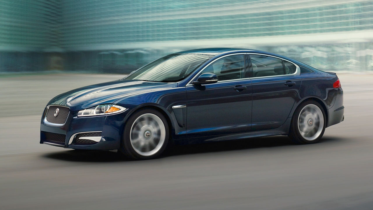 Jaguar XF running on city road