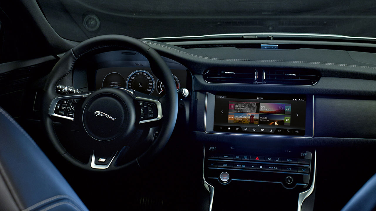 Jaguar XF Steering wheel along with Infotainment Screen