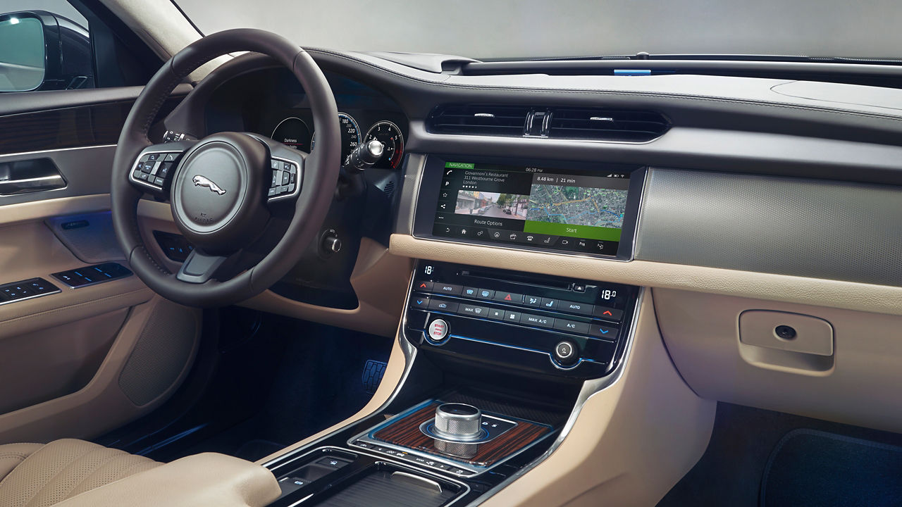 Jaguar XF Black and Beige color combination interior 