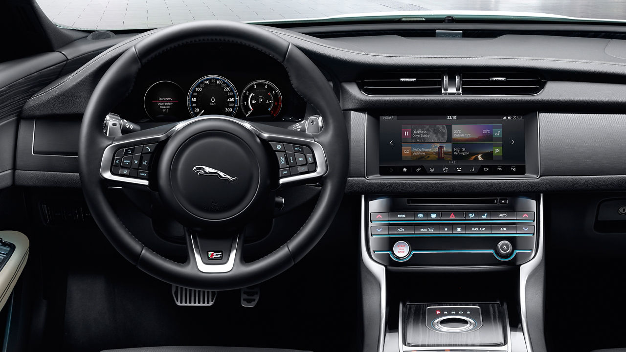 Jaguar XF Steering wheel along with Infotainment Screen