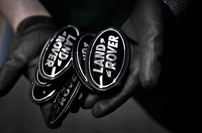 Close up of Land Rover badges