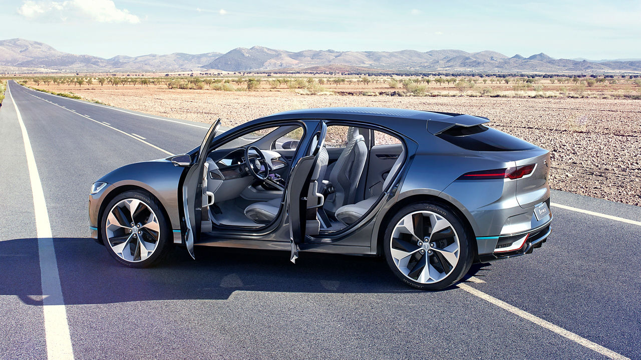 Jaguar I-PACE Parked at Road in Cross Direction with All Doors Open
