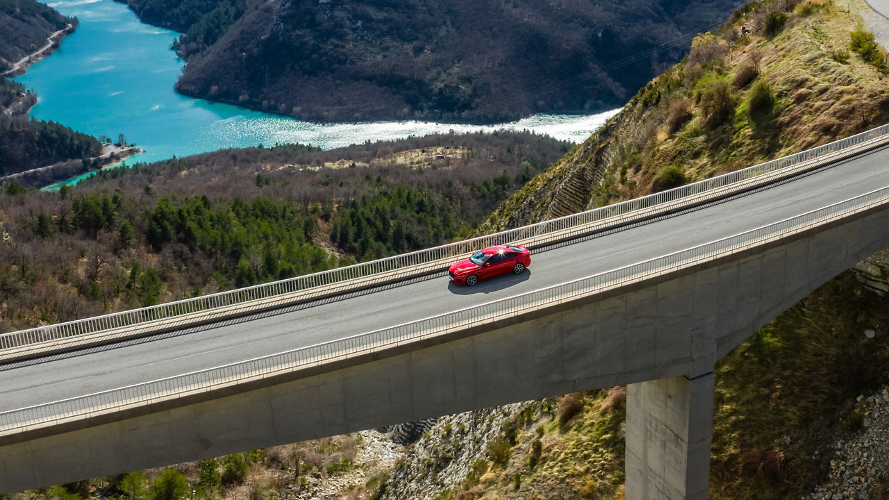 Jaguar XE top view on sea link bridge