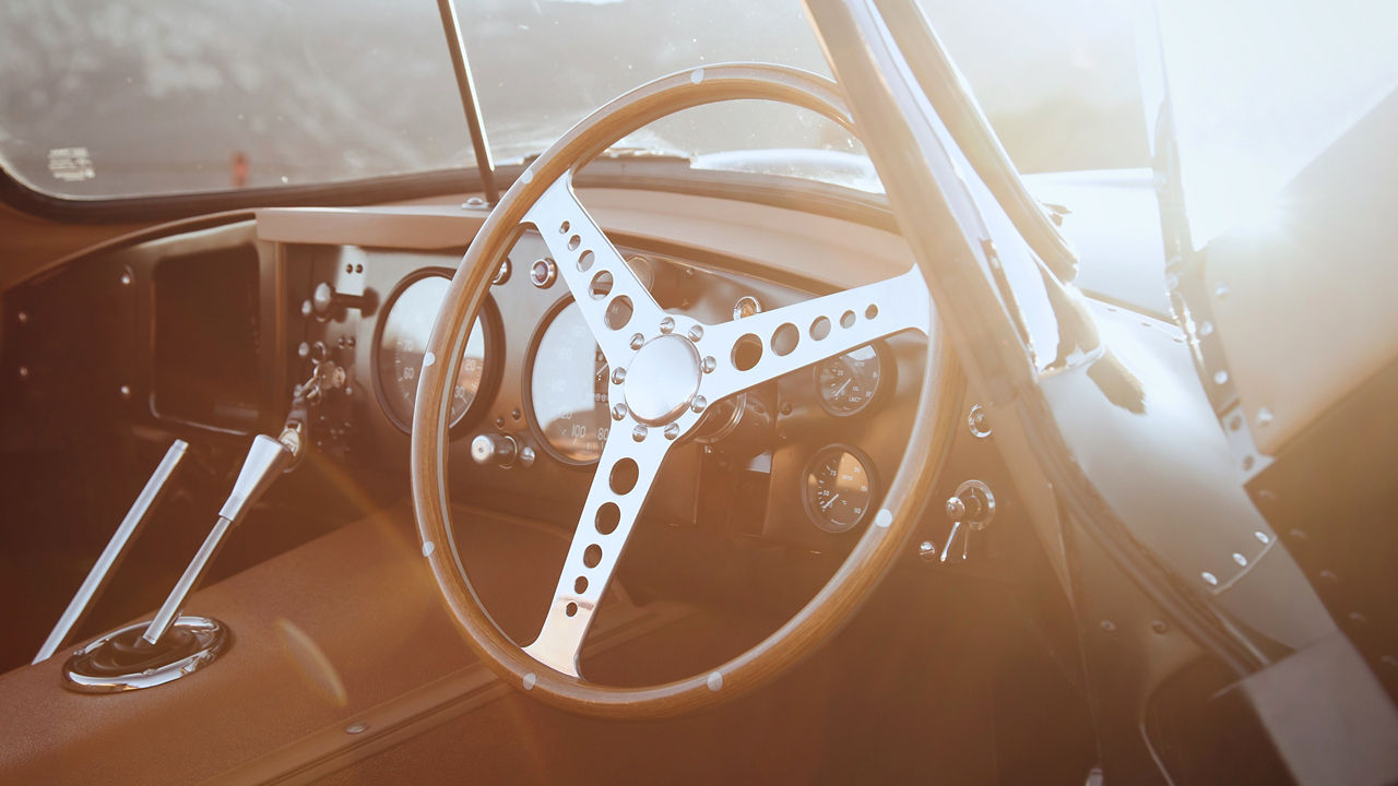 Jaguar XKSS car  dash board and steering wheel close up view