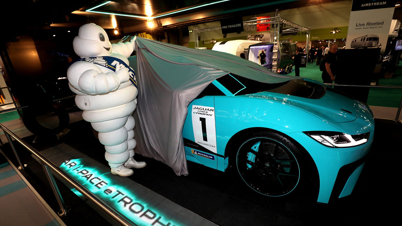 Michelin dummy showcasing Jaguar I Pace eTrophy car in Motorshow